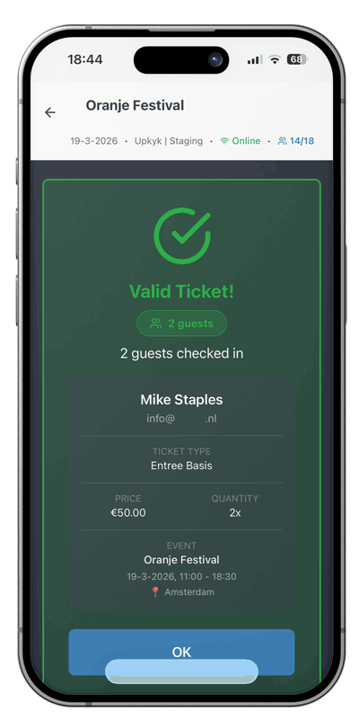 Green valid ticket result screen with attendee details